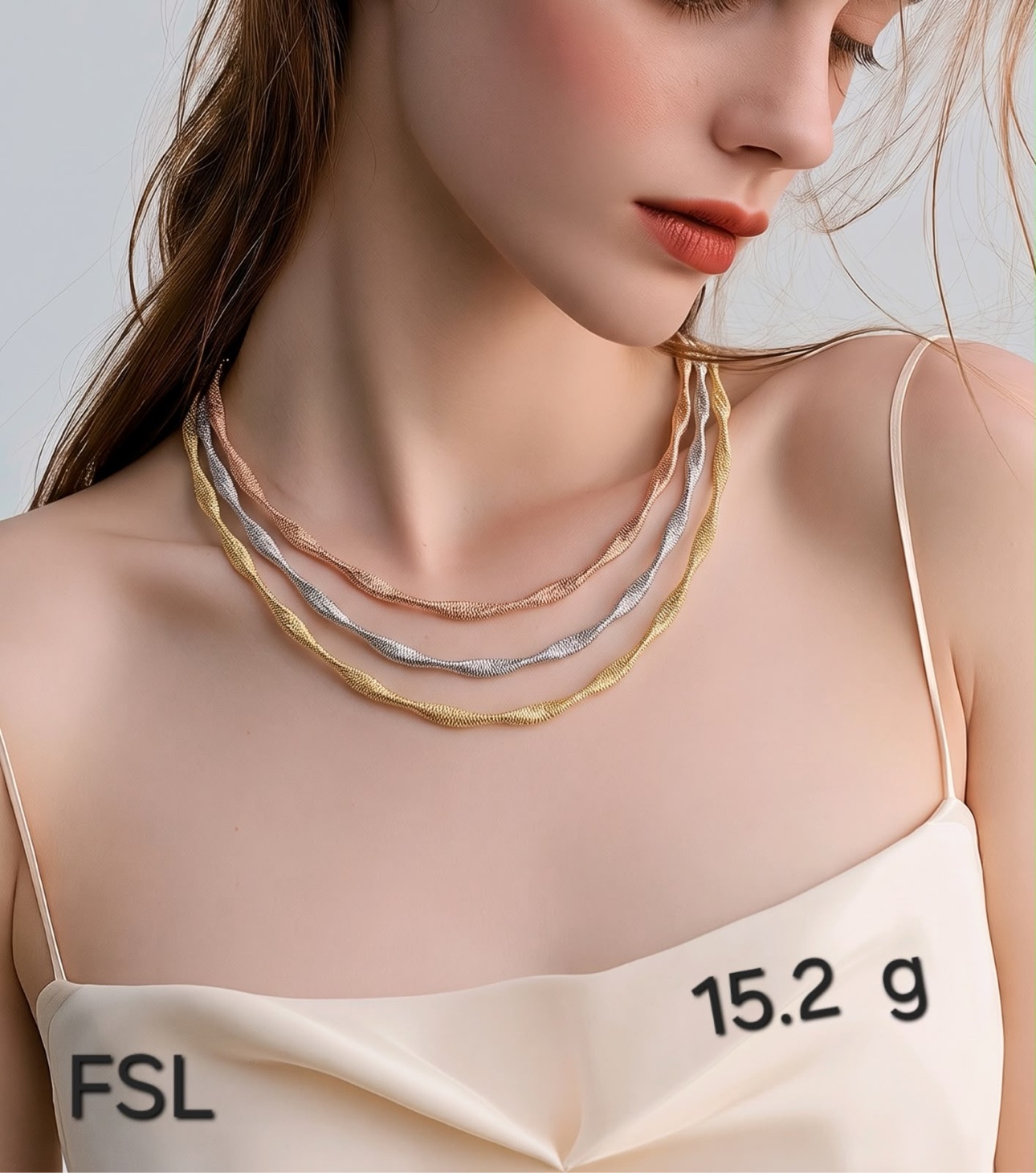 Layered tri-color wave necklace worn as a statement piece